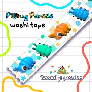 May include: A roll of washi tape featuring a grid pattern with blue, green, and orange pillbug illustrations. The tape includes the text Pillbug Parade washi tape and @comfysproutco. The pillbugs have googly eyes and segmented bodies.