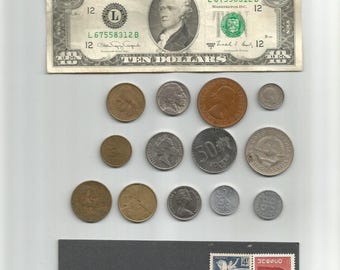 Lot of 25 with US Ten Dollar Bill 13 World Coins including silver 3 Pence and 11 Stamps