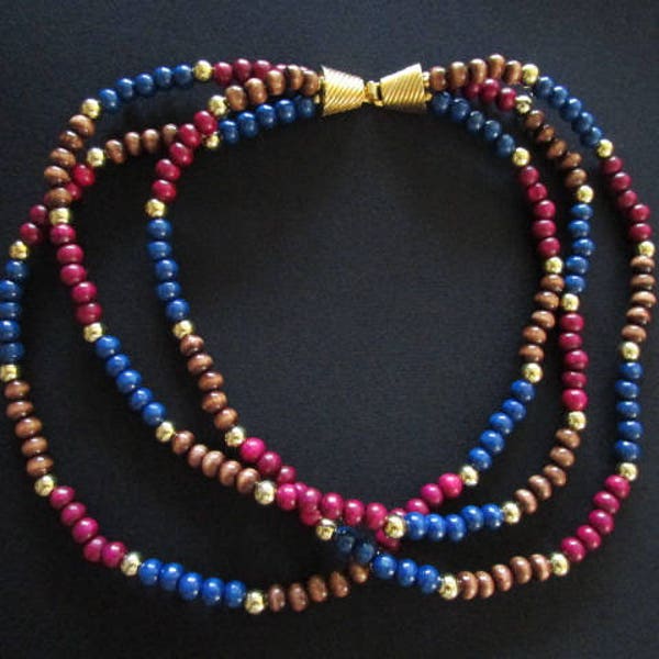 Lovely Vintage 1981 Mimi Di N Princess Mimi Di Niscemi Costume Jewelry Blue Brown Purple/Pink 3-Strand Wood Beaded Necklace Goldtone Accents