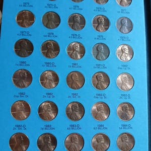 Collection of Pennies 3 Indian Head and 71 Lincoln One Cent US Coins in Whitman Folder
