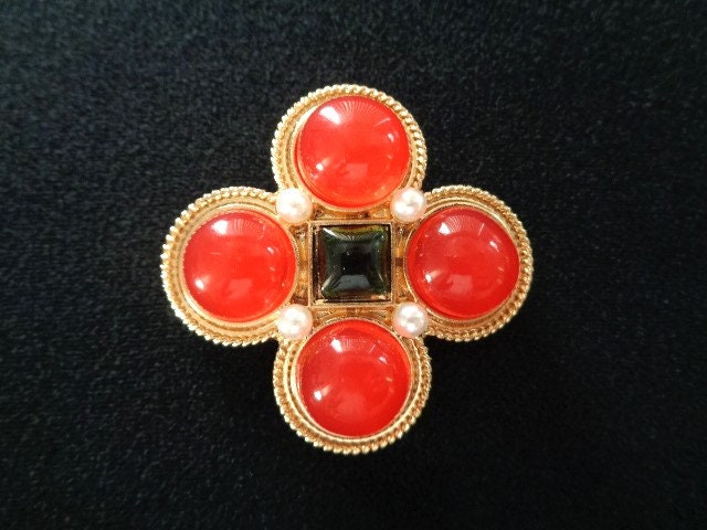 Embellished ornate deals ruby jewel