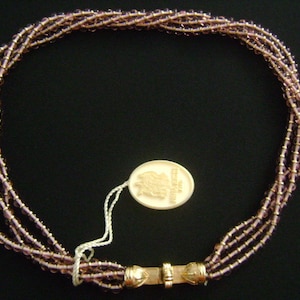 Designer NINA RICCI Paris Purple Glass Goldtone Spacer Beads 4-Strand Fancy Clasp Classic Torsade Necklace Pristine Condition Gorgeous Piece