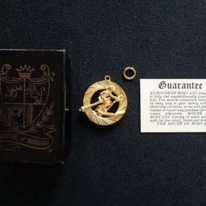 Vintage HOUSE OF BORVANI Textured Gold Plating Three Dimensional Sport Skis Skier Charm or Pendant Old Store Stock Item Excellent Condition