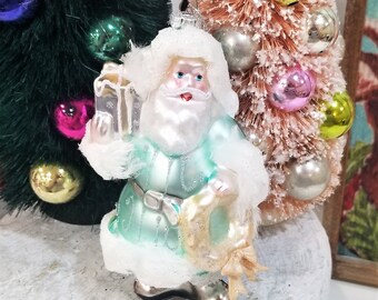 Faux Fur Blown Glass Blue Santa Christmas Ornament Holding Wreath & Gift