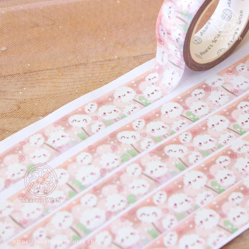 small and kawaii white dandelions washi tape with a cozy beige and brown background and green leaves