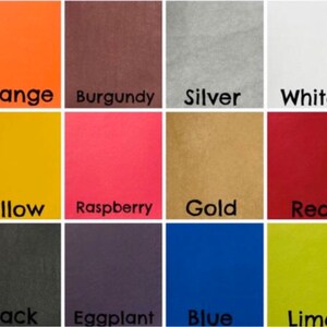May include: A color chart with 12 fabric swatches. The swatches are labeled with the following colors: Orange, Burgundy, Silver, White, Yellow, Raspberry, Gold, Red, Black, Eggplant, Blue, and Lime.