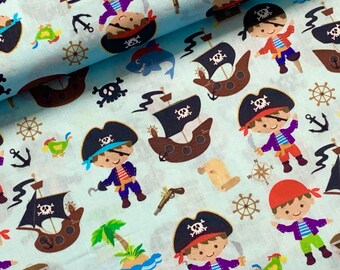 Fabric pirates on light blue 100% cotton