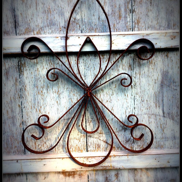 Wrought Iron Double Fleur de lis Wall Art.  Large scrolled metal.  Double Fleur de lis