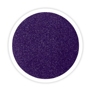 May include: A close-up of a deep purple glitter, perfect for crafting projects.