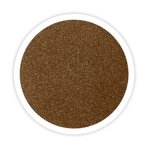 May include: A close-up of a brown glitter texture. The glitter is fine and evenly distributed, creating a shimmering effect.