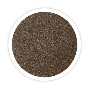 May include: A close-up of a brown glitter, which is a fine, sparkly material often used for crafts and decorations.