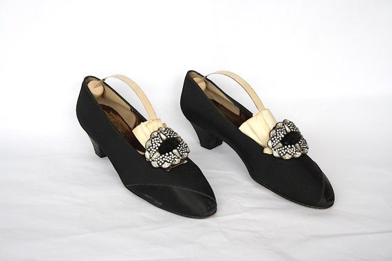 black silk pumps