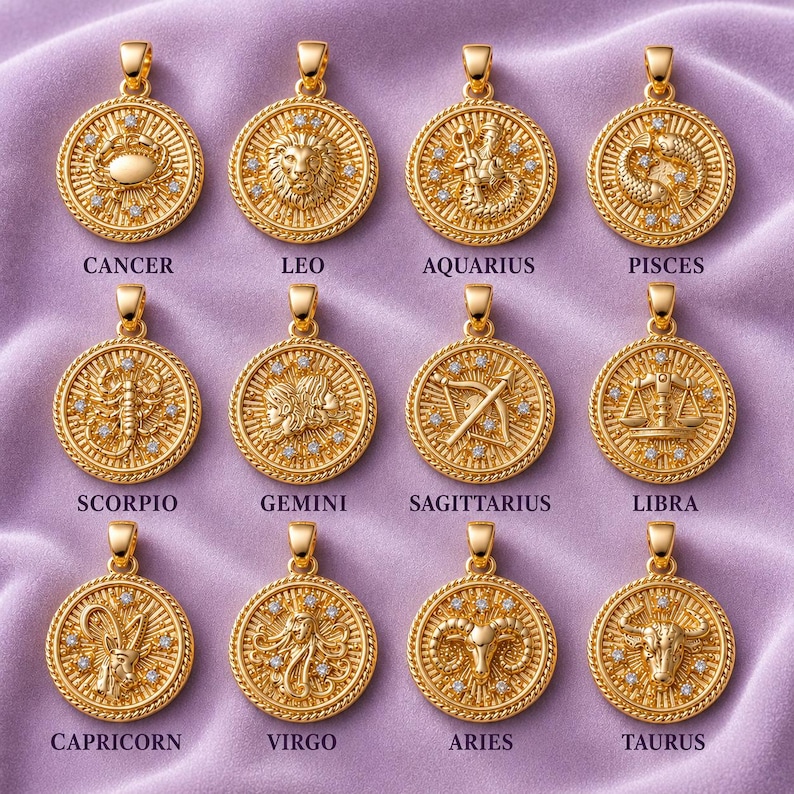 May include: Gold-colored zodiac pendant necklaces. Each round pendant features a different zodiac symbol, such as a crab for Cancer or a lion for Leo, and is accented with small, clear gemstones. The names of the zodiac signs are printed below each pendant.