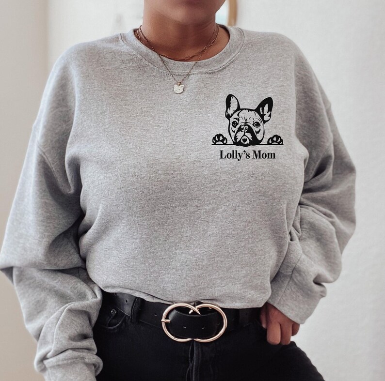May include: Gray sweatshirt with a black graphic of a French bulldog peeking over the top of a sign that says "Lolly's Mom".