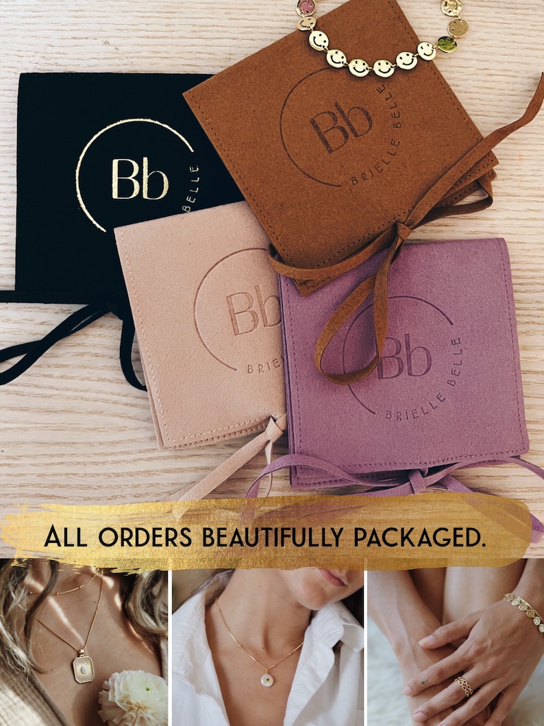 May include: An assortment of jewelry packaging in black, tan, blush, and purple. Each package has a debossed logo and the words "Brielle Belle". A gold bracelet with smiley faces is visible. The text "ALL ORDERS BEAUTIFULLY PACKAGED" is also present.