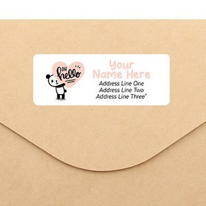 May include: A brown envelope with a pink and white sticker featuring a panda holding a heart with the text "say hello". The sticker also includes the text "Your Name Here", "Address Line One", "Address Line Two", and "Address Line Three".