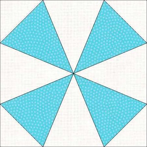 May include: A white square with four blue triangles, each with a white polka dot pattern, arranged in a starburst pattern.