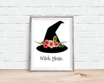 May include: A black witch hat with pink and white flowers and green leaves. The text "Witch, Please." is below the hat.