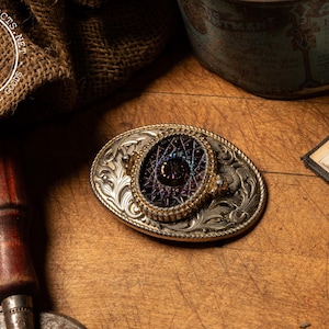 Ornate Belt Buckle with Carnival Glass Center
