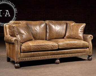Distressed Leather Nailhead Sofa with Turned Bun Feet