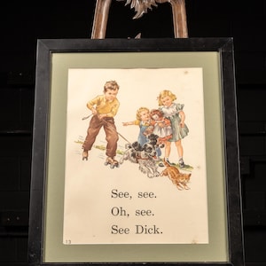 May include: Framed vintage children's illustration featuring three children, a dog, and a cat. The boy on the left is roller skating. The text at the bottom reads "See, see. Oh, see. See Dick."
