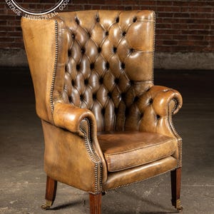 Mid-Century Leather High-Wingback Rolling Armchair In Brown