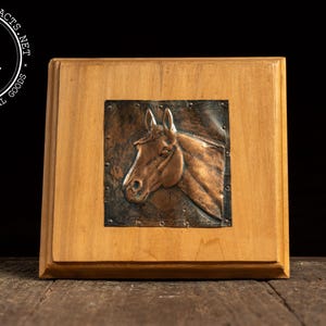 Copper Repoussé of Horse on Wooden Plaque