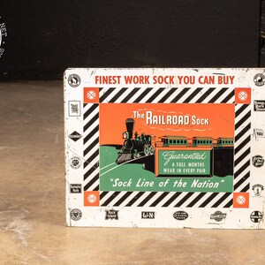 c. 1950 Rail Road Sock Tin Sign