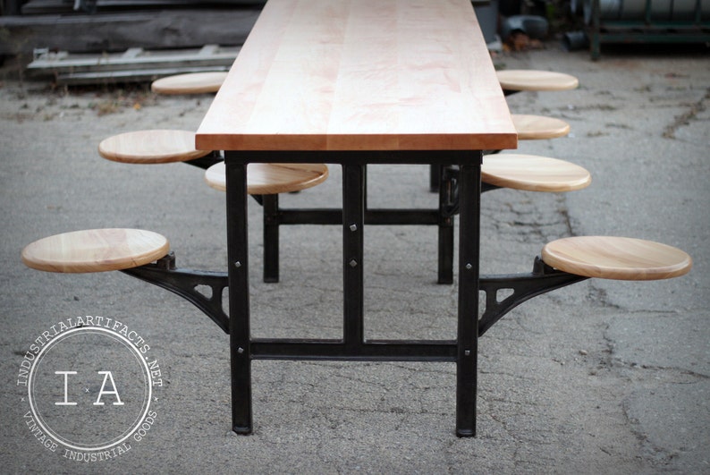 Industrial Cast Iron Swing Stool Dining Table