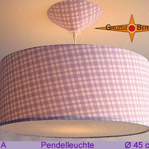 May include: A purple and white gingham patterned pendant light with a 45-inch diameter. The light is hanging from a ceiling and has a white ceiling fixture.