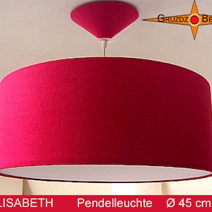 May include: A red fabric pendant light with a white inner lining. The light is 45 inches in diameter. The light is hanging from a white ceiling.