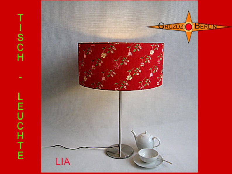 Red table lamp LIA red table lamp with flower pattern