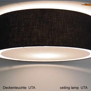 Plafoniera nera UTA con diffusore, disponibile in diverse misure a scelta.