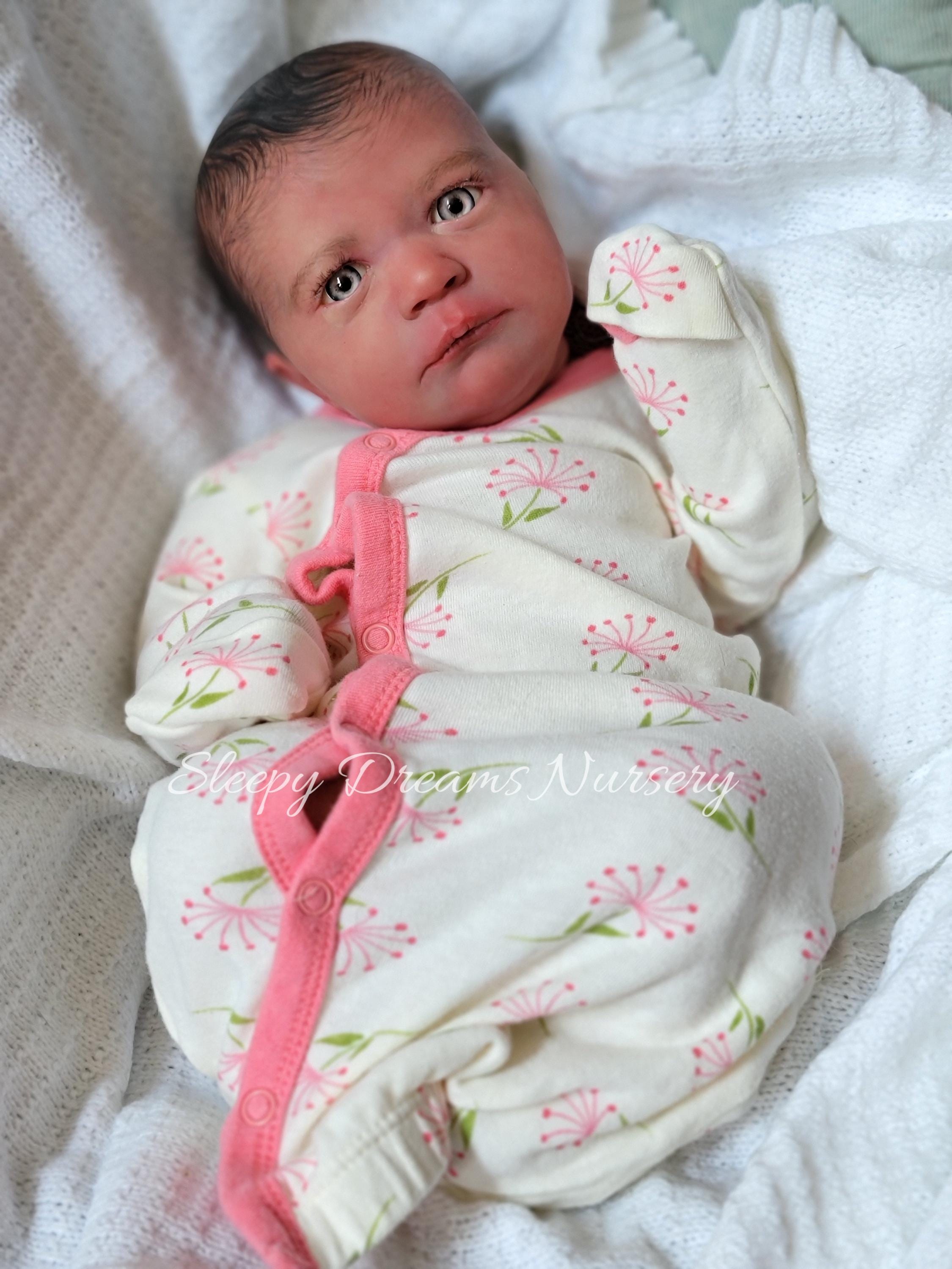 realborn skya awake cuddle baby.