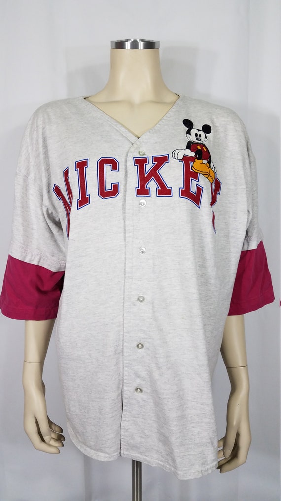 pink and white baseball jersey