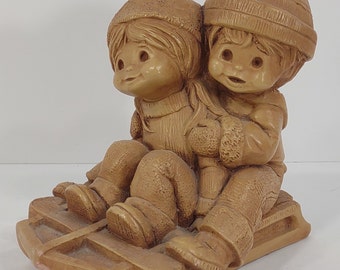 Vintage Fannykins Slippin' N' Slidin' girl and boy sledding statue figurine