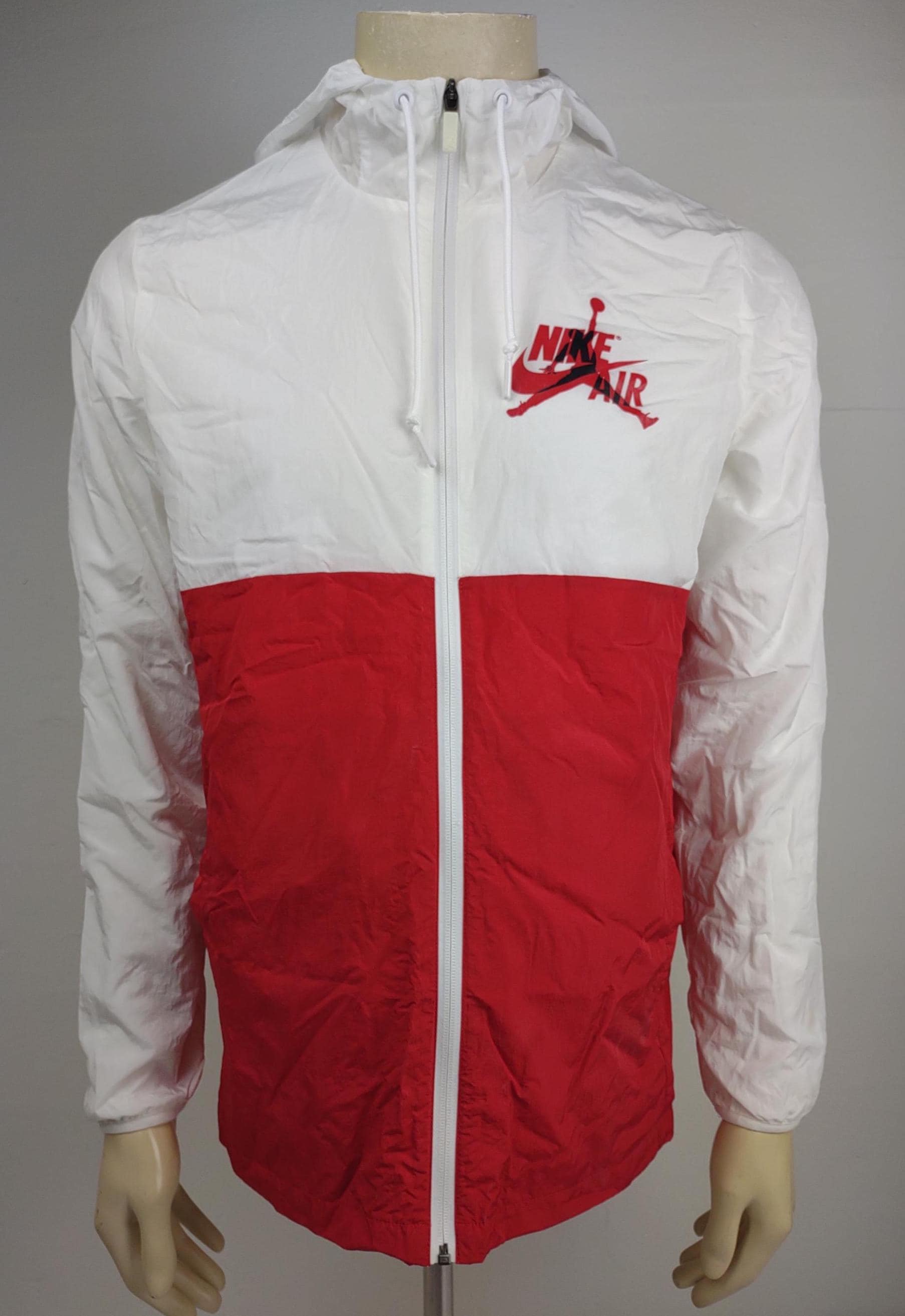 white and red windbreaker nike