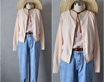 palest peach acrylic long sleeve button down cardigan sweater . 90s vintage . xs/s