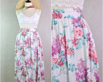 the villager country cottage white pink rose lilac print rayon high rise a line midi skirt with pockets .  31" waist . 90s vintage