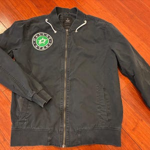 Jaqueta Bomber Reciclada Dallas Stars (Pequena)