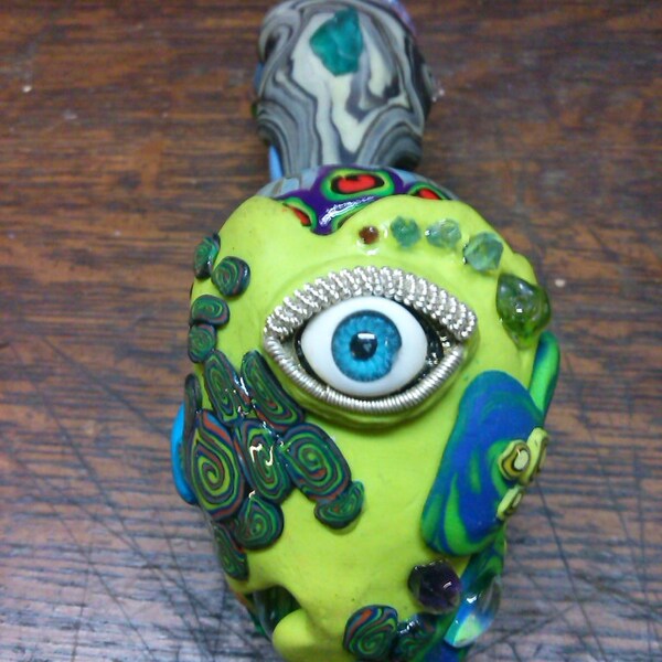 intricately detailed sherlock style pipe featuring wire wrap eye and other inclusions