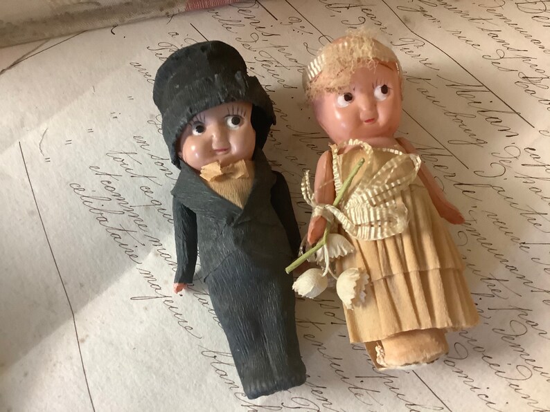 Antique celluloid bride and groom wedding cake toppers image 0