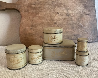 Children’s antique toys farmhouse cream and gold canister set