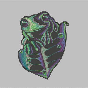 May include: Embroidered patch of a green frog sitting on a purple and green leaf. The frog has a wide smile and large eyes.
