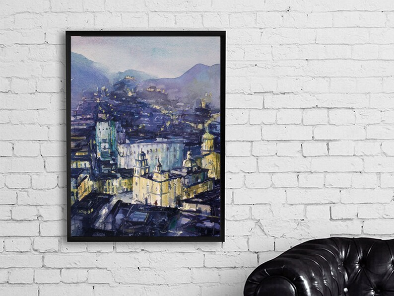 May include: A watercolor painting of a city skyline with buildings and hills in the background. The city is painted in shades of blue, purple, and yellow. The sky is a light blue with a hint of pink.