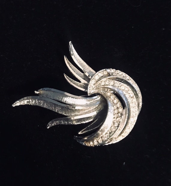 BSK Silver Tone Brooch with Crystals