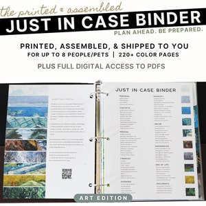 May include: An open binder with a black cover and brown leather accents. The binder is labelled "Just in Case Binder" and contains pages with information on personal, property, contacts, medical, finances, and more. The pages are decorated with watercolour paintings of landscapes.