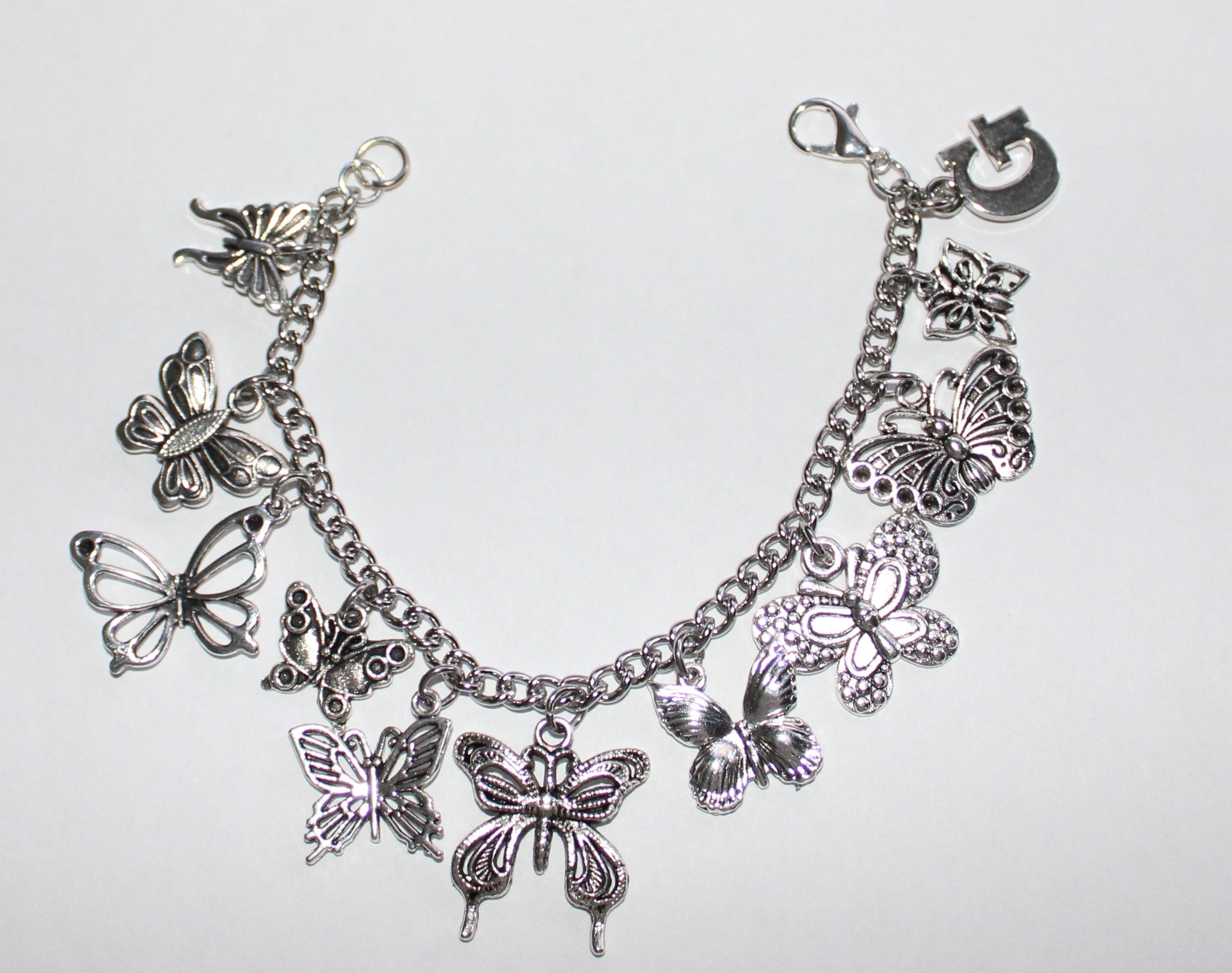 Silver butterfly charm bracelet deals