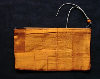 Pumpkin spice orange Dupioni silk patchwork zippered pouch handmade by me, Miss Patch