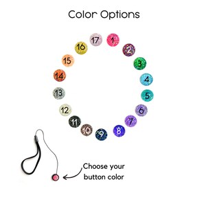 May include: A color chart with 17 different glitter colors, numbered 1 through 17. The colors are arranged in a circle. The text "Choose your button color" is below the circle.
